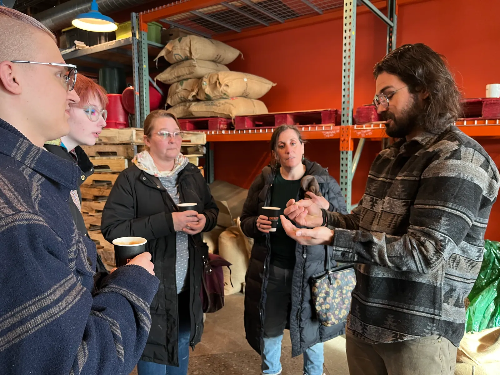 Rose Cottage Baking Co. learning about Duluth Coffee Company's locally roasted beans
