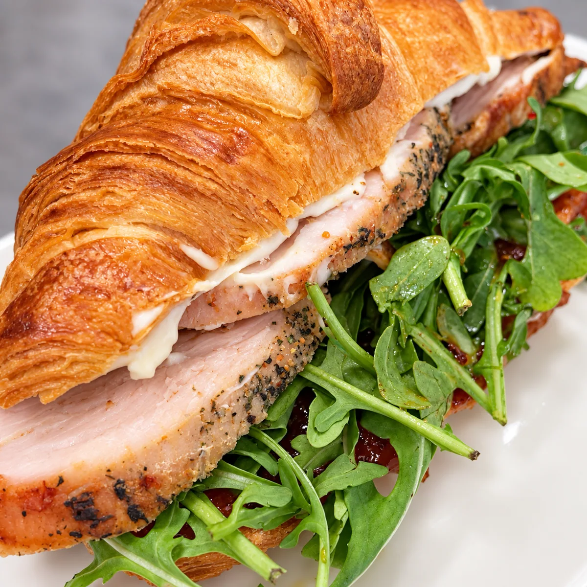 Rose Cottage Baking Co. Turketta croissant with turkey, arugula, and Calabrian pepper marmalade